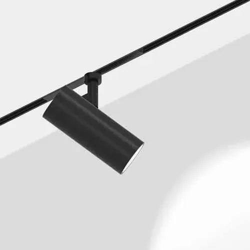 Catalogue image: black cylindrical spotlight head fitted on a magnetic track
