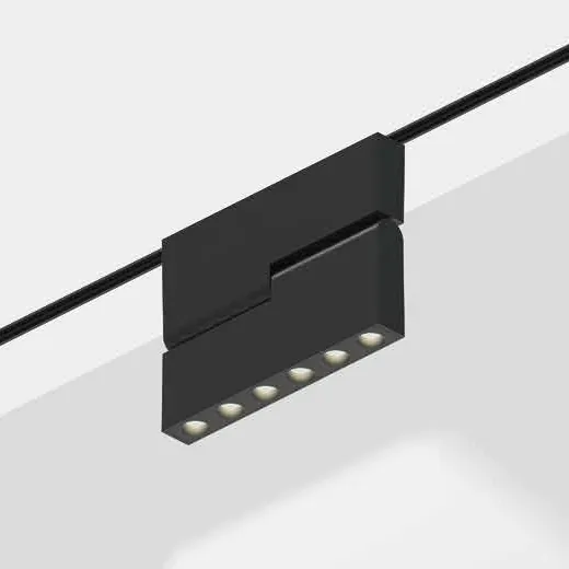 Catalogue image: black folding grille light fitted on a magnetic track