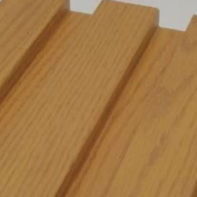 Catalogue image: golden oak-effect wall panel with wide ribs