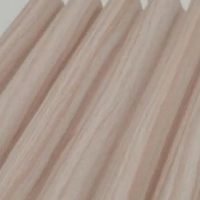 Catalogue image: light pink wood-effect wall panel with half-round flutes